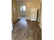 Kitchen featuring wood-look floors and white refrigerator at 3059 5Th E Ave, Indianapolis, IN 46221