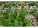An aerial view shows the backyard and the surrounding community at 3818 S Creekside Dr, New Palestine, IN 46163