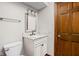 Bright bathroom features a modern vanity with granite countertop and updated fixtures at 3818 S Creekside Dr, New Palestine, IN 46163