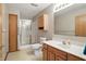 Functional bathroom with single vanity and shower stall ready for move in at 3920 Oak Harbor Ln, Indianapolis, IN 46237