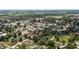 City aerial shot features the property and its location within a charming town with a water tower at 421 E Delaware St, Fortville, IN 46040