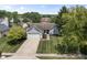 Charming home with a well-manicured lawn, mature trees, and a two-car garage in a peaceful neighborhood at 421 E Delaware St, Fortville, IN 46040