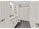 Bathroom featuring sleek fixtures, granite countertops, and a shower-tub combo for convenience at 421 E Delaware St, Fortville, IN 46040