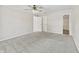 Spacious bedroom with neutral carpet and walk-in closet offers ample storage and comfort at 421 E Delaware St, Fortville, IN 46040