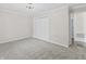 Bedroom featuring neutral carpet and a large closet offers ample storage and comfort at 421 E Delaware St, Fortville, IN 46040