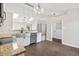 Modern kitchen with stainless steel appliances, white cabinets, and stylish lighting at 421 E Delaware St, Fortville, IN 46040
