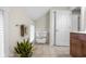 Well-lit bathroom featuring a towel rack, storage and tiled flooring at 4224 River Rd, Columbus, IN 47203