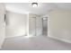 Bright bedroom with neutral walls and carpet and closet at 4224 River Rd, Columbus, IN 47203