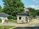 Community gatehouse with red and white barricades at 4501 N Wheeling Ave # 5E4, Muncie, IN 47304