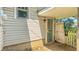 A view of the back door with secure gate, offering privacy and convenience at 4708 Fletcher Ave, Indianapolis, IN 46203