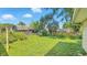 Expansive backyard with mature trees, shed, and plenty of room for outdoor activities at 4708 Fletcher Ave, Indianapolis, IN 46203