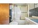 Bathroom features a shower/tub combo, toilet, and vanity with a sink, providing functionality at 4708 Fletcher Ave, Indianapolis, IN 46203