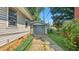 View of the detached garage and driveway, showcasing the home's practical features and access at 4708 Fletcher Ave, Indianapolis, IN 46203