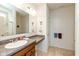 Accessible bathroom with a granite countertop and a view of the shower at 4905 Lilium Dr, Plainfield, IN 46168