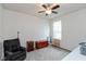 Spacious bedroom featuring a ceiling fan, neutral carpet and furnishings at 4905 Lilium Dr, Plainfield, IN 46168