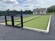 Community bocce ball court with turf surface and garden shed at 4905 Lilium Dr, Plainfield, IN 46168