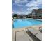 Relaxing community pool area featuring comfortable lounge chairs and seating at 4905 Lilium Dr, Plainfield, IN 46168