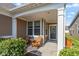 Inviting front porch with seating, offering a cozy spot to relax and enjoy the outdoors at 4905 Lilium Dr, Plainfield, IN 46168