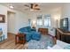Comfortable living room with a plush sectional, area rug, and ample natural light at 4905 Lilium Dr, Plainfield, IN 46168