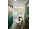 Updated bathroom features a single sink vanity with new fixtures at 514 E 2Nd St, Sheridan, IN 46069