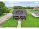 Charming two-story home with a welcoming front porch and well-maintained lawn at 514 E 2Nd St, Sheridan, IN 46069