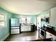 Well-lit kitchen featuring stainless steel appliances and ample counter space at 514 E 2Nd St, Sheridan, IN 46069