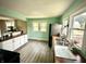 Stylish kitchen with natural light, stainless steel sink, and wood countertops at 514 E 2Nd St, Sheridan, IN 46069
