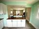 Kitchen featuring a wood countertop, white cabinets, and an open layout at 514 E 2Nd St, Sheridan, IN 46069