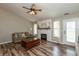 Cozy living room with decorative fireplace and neutral color palette at 59 Millet Ct, Danville, IN 46122
