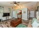 Comfortable living room with vaulted ceilings and wood-look floors at 59 Millet Ct, Danville, IN 46122