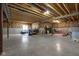 Unfinished basement with exposed wood ceiling, concrete floor, and window for natural light at 6137 Hardwick Dr, Whitestown, IN 46075