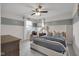 Comfortable bedroom featuring a queen bed, lots of natural light and a neutral color palette at 6137 Hardwick Dr, Whitestown, IN 46075