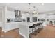 Open concept kitchen with a large island, pendant lighting, and stainless steel appliances at 6137 Hardwick Dr, Whitestown, IN 46075