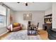 Comfortable office space with custom desk and shelving, unique furniture, and natural light from the window at 6137 Hardwick Dr, Whitestown, IN 46075