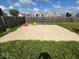 Spacious backyard featuring a large concrete patio, perfect for outdoor entertaining at 7532 Gold Rush Ct, Camby, IN 46113