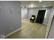 Finished basement featuring modern lighting and a stylish accent chair at 7532 Gold Rush Ct, Camby, IN 46113