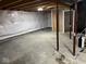 Unfinished basement with concrete floor and exposed ceiling, awaiting customization at 7532 Gold Rush Ct, Camby, IN 46113