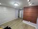 Finished basement with two accent walls and updated modern lighting at 7532 Gold Rush Ct, Camby, IN 46113