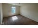 Bedroom featuring a window with blinds and carpeted flooring at 7532 Gold Rush Ct, Camby, IN 46113