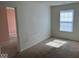 Bedroom showcasing a window with blinds and carpeted flooring at 7532 Gold Rush Ct, Camby, IN 46113