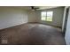 Spacious bedroom featuring a ceiling fan, a large window and neutral wall color at 7532 Gold Rush Ct, Camby, IN 46113
