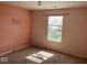 Bedroom featuring a window and wall decor at 7532 Gold Rush Ct, Camby, IN 46113