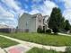 Street view of two story home with brick and vinyl siding, lawn, and street access at 7532 Gold Rush Ct, Camby, IN 46113