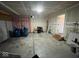 Spacious unfinished garage ready for customization and organization at 7532 Gold Rush Ct, Camby, IN 46113