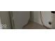A utility room with a washer and dryer hookups and beige tile flooring at 7532 Gold Rush Ct, Camby, IN 46113