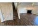 Large living room with hard surface floors, a fireplace, stairs and neutral walls at 7532 Gold Rush Ct, Camby, IN 46113