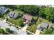 Aerial view of a charming suburban home featuring a driveway and lush green lawn at 8380 Kolven Dr, Avon, IN 46123
