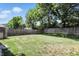 Fenced backyard with lush green grass, providing privacy and ample space at 8380 Kolven Dr, Avon, IN 46123