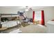 Bedroom with bunkbed, basketball game and red curtains at 8380 Kolven Dr, Avon, IN 46123
