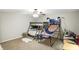 Bright bedroom features bunk beds and a basketball game, offering a fun space at 8380 Kolven Dr, Avon, IN 46123